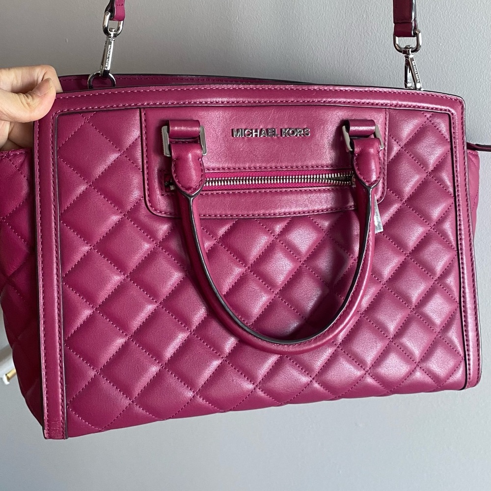 Michael kors quilted satchel dark fuchia with silver Hardware.